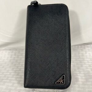 1002: Prada Black Saffiano Leather Zip Around Continental Wallet